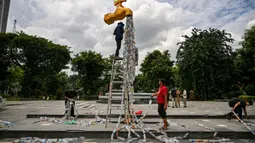 Aksi ini untuk meningkatkan kesadaran masyarakat akan dampak plastik sekali pakai terhadap lingkungan dan kesehatan manusia. (Juni KRISWANTO/AFP)