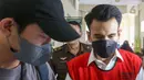 Terdakwa kasus pelanggaran UU ITE Adam Deni berjalan saat sidang di Pengadilan Negeri Jakarta Utara, Selasa (7/6/2022). Adam Deni menjalani sidang lanjutan atas dugaan pelanggaran UU ITE yang beragendakan pembacaan nota pembelaan atau pledoi atas tuntutan 8 tahun penjara dari Jaksa Penuntut Umum (JPU). (Liputan6.com/Herman Zakharia)