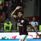 AC Milan's forward from Brazil Luiz Adriano celebrates after scoring a goal during the Italian Serie A football match between AC Milan and Empoli at San Siro Stadium in Milan on August 29, 2015. AFP PHOTO / GIUSEPPE CACACE 