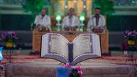 Ilustrasi mengaji, baca Al-Qur'an. )Photo by mostafa meraji on Unsplash)