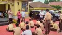 Polisi dan Satgas Pelajar mengamankan belasan siswa yang hendak melakukan tawuran di kawasan Empang, Kota Bogor. (Dok. Liputan6.com/Achmad Sudarno)