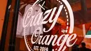 Crazy Orange adalah salah satu gerai yang menjual produk Persija Jakarta di Percetakan Negara, Selasa (12/9/2017). Persija dan The Jakmania resmi meluncurkan 43 store di Jabodetabek. (Bola.com/Nicklas Hanoatubun)