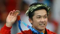 Taufik Hidayat, saat menjuarai nomor tunggal putra di Olimpiade Athena 2004. (chirpstory.com)