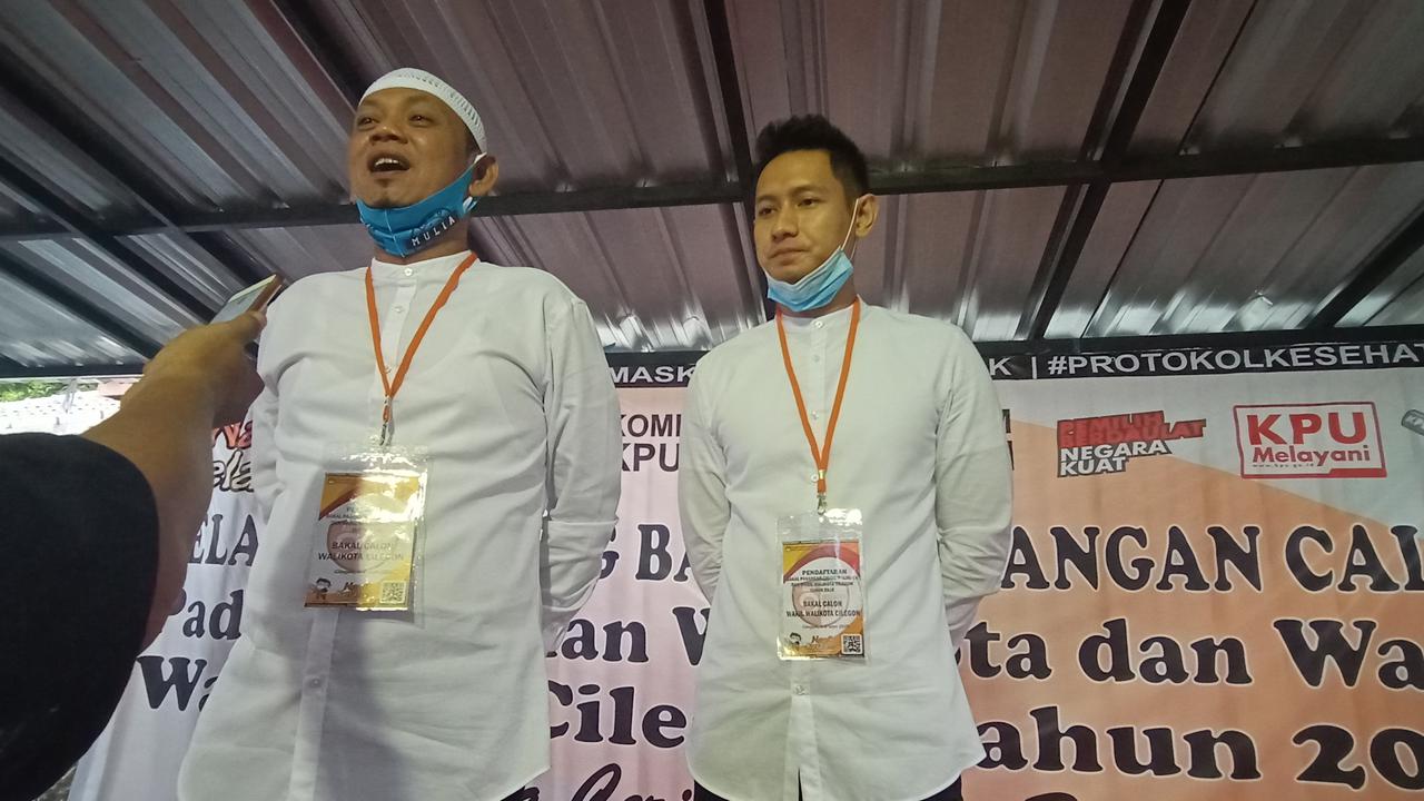 Pasangan Ali Mujahidin dan Lian Firman mendaftar Pilkada ke KPU Cilegon, Jumat (4/9/2020).