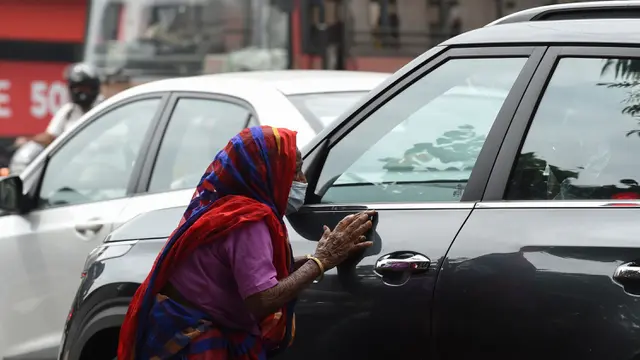 Kehidupan Sehari-hari Warga India Saat Kematian Covid-19 Tembus 50 Ribu