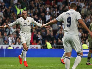 Selebrasi Gareth Bale usai mencetak gol ke gawang Legia Warszawa pada laga grup F Liga Champions di Santiago Bernabeu stadium, Madrid, Rabu (19/10/2016) dini hari WIB. (REUTERS/Sergio Perez)