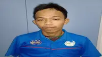 Pelaku utama garong di area pengiriman Kargo Bandara Internasional Sultan Hasanuddin Makassar, Asriadi saat diinterogasi di Posko Resmob Polda Sulsel (Liputan6.com/ Eka Hakim)
