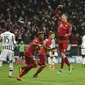 Bayern Muenchen lolos ke babak 8 besar Liga Champions usai menghajar Juventus dengan skor 4-2 di Allian Arena, dinihari tadi. (ODD ANDERSEN / AFP)