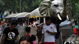 Hingga sore ini sebanyak 18.492 orang memadati Ragunan dalam mengisi waktu libur Natal 2014, Jakarta, Kamis (25/12/2014). (Liputan6.com/Miftahul Hayat) 
