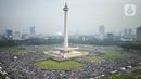Suasana Aksi Bela Palestina di Monumen Nasional (Monas), Jakarta, Sabtu (2/12/2023). Aksi tersebut bertemakan "Munajat Kubro untuk Keselamatan NKRI (Negara Kesatuan Republik Indonesia) dan Kemenangan untuk Palestina". (Liputan6.com/Angga Yuniar)
