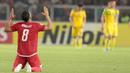 Ungkapan syukur ala Addison Oliveira usai membobol gawang Song Lam Nghe An FC pada laga Piala AFC 2018 di Stadion Utama GBK, Senayan, Jakarta, (13/3/2018). Persija Jakarta menang 1-0. (Bola.com/Nick Hanoatubun)