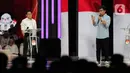 Calon Wakil Presiden nomor urut 1 Muhaimin Iskandar (kiri) dan Calon Wakil Presiden nomor urut 2 Gibran Rakabuming Raka saat debat keempat Pemilu 2024 di Jakarta Convention Center (JCC), Jakarta. (Liputan6.com/Angga Yuniar)