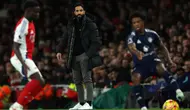 Bermain tandang ke markas Arsenal, tim racikan pelatih Ruben Amorim harus menelan pil pahit kekalahan 0-2. (Adrian Dennis/AFP)