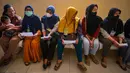 Peningkatan kualitas kesehatan masyarakat Indonesia dan pengurangan beban penyakit yang bisa dicegah menjadi tujuan prioritas dari program ini. (JUNI KRISWANTO/AFP)