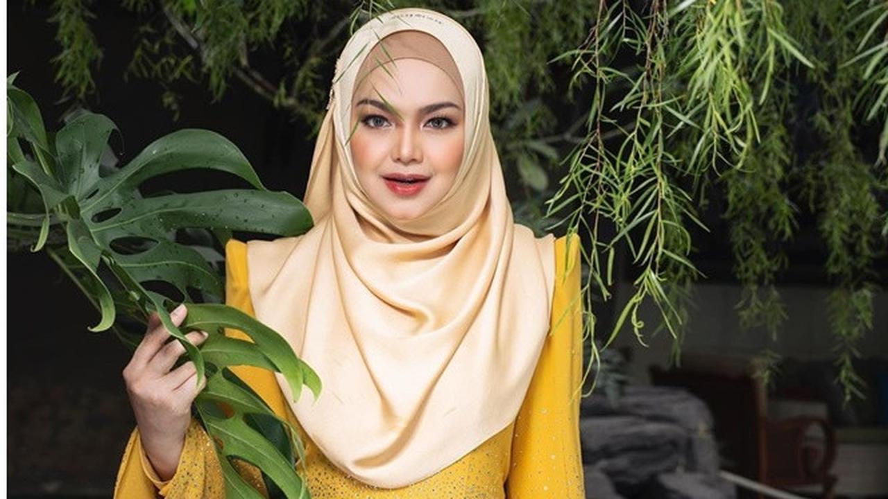 Hamil Anak Kedua di Usia 41 Tahun, Ini 6 Potret Siti Nurhaliza Pamer Baby Bump