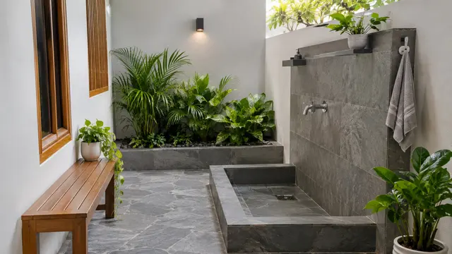 Desain Tempat Wudhu di Samping Rumah dengan Lantai Batu Bertekstur