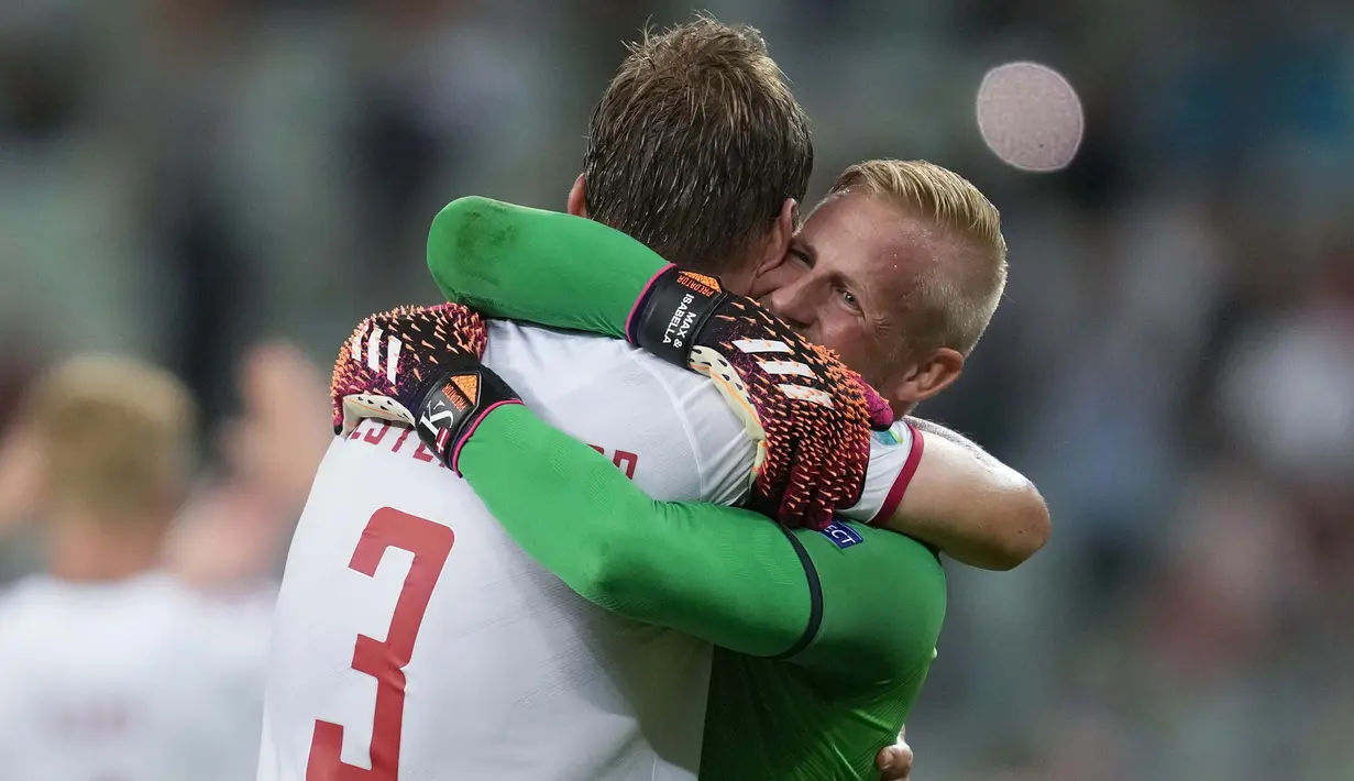 Timnas Denmark berhasil melaju ke babak semifinal Euro 2020 usai mematahkan tren positif Timnas Republik Ceska di pertandingan babak perempat final Euro 2020. Denmark lolos ke semifinal untuk pertama kalinya sejak 1992. (Foto: AP/Pool/Darko Vojinovic)