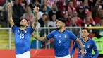 Bek Italia, Cristiano Biraghi (kiri) berselebrasi usai mencetak gol ke gawang Polandia selama UEFA Nations League Grup 3 di Silesian Stadium, Polandia (14/10). Gol Biraghi berhasil membawa Italia menang  atas Polnadia 1-0. (AFP Photo/Janek Skarzynski)