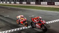 Andrea Dovizioso finis di posisi pertama pada MotoGP Qatar, hanya unggul 0,020 detik dari Marc Marquez. (Twitter/MotoGP)