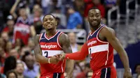 Duo bintang NBA yang membela Washington Wizards, Bradley Beal (kiri) dan John Wall (kanan). (AFP/Rob Carr)