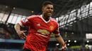 Marcus Rashford. Striker asli Inggris ini mencetak gol debutnya di Liga Inggris dalam usia 18 tahun 120 hari saat Manchester United menang 3-2 atas Arsenal pada Februari 2016 di Old Trafford. (AFP/Oli Scarff)