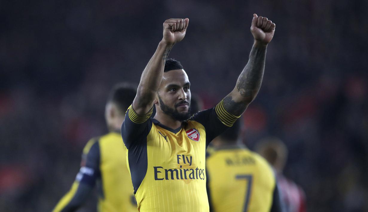 Theo Walcott merayakan golnya ke gawang Southampton pada putaran keempat Piala FA musim 2016-2017 di St Mary's Stadium,  (28/1/2017. Arsenal menang 5-0. (Nick Potts/PA via AP)