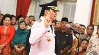 Basuki Tjahaja Purnama mengucapkan sumpah jabatan saat pelantikan dirinya menjadi Gubernur DKI Jakarta di Istana Negara, Rabu (19/11/2014). (Liputan6.com/Faizal Fanani)