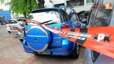 Sebanyak 18 mobil milik Akil Mochtar itu disita dari 3 lokasi, yaitu Depok, daerah puncak di kawasan Bogor, dan Cempaka Putih (Liputan6.com/Faisal R Syam)