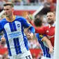 Gelandang Brighton and Hove Albion, Pascal Gross setelah mencetak gol ke gawang Manchester United pada laga pekan pertama Liga Inggris 2022/2023 di Old Trafford Stadium, Manchester (7/8/2022). Pascal Gross total mencetak 6 gol dan 2 assist dari 12 laga bersama Brighton and Hove Albion saat menghadapi Manchester United di semua ajang. Dua gol terakhirnya terjadi pada pekan pembuka Liga Inggris 2022/2023 saat Brighton menang 2-1. (AFP/Lindsey Parnaby)