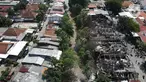 Foto udara lokasi kebakaran pemukiman di kawasan Manggarai, Jakarta, Minggu (18/12/2022). Kebakaran tersebut menghanguskan sekitar 50 rumah semi permanen yang ada di bantaran sungai Ciliwung. (Liputan6.com/Herman Zakharia)