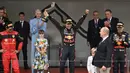 Reaksi pebalap Red Bull, Sergio Perez saat menjuarai Formula 1 GP Monako 2021 pada 29 Mei 2021. Ini menjadi kemanangan ketiga Perez di ajang balap jet darat tersebut. (AFP/Loic Venance)