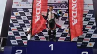 Pembalap binaan Astra Honda Motor (AHM), Herlian Dandi, memenangi balapan pertama pada ajang Thailand Talent Cup (TTC) seri kelima di Chang International Circuit, Buriram, Thailand, Sabtu (7/9/2019). (Media AHM)