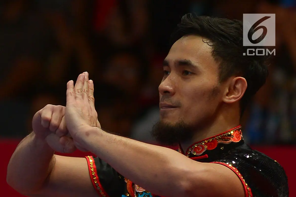 Aksi Atlet Wushu Achmad Hulaefi Saat Raih Medali Perunggu