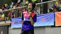 Ekspresi tunggal putri, Putri Kusuma Wardani, setelah menyumbangkan poin untuk Indonesia pada laga kontra Singapura di Kejuaraan Asia Junior 2018, di Jaya Raya Sport Hall Training Center, Jakarta, Minggu (15/7/2018). (PBSI)