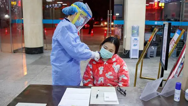 Kisah Guo Qin, Perawat yang Berhasil Sembuh dari Virus Corona