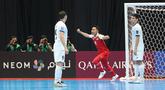 Kapten Timnas Futsal Indonesia, Mochammad Iqbal, melakukan selebrasi setelah mencetak gol ke gawang Kirgistan pada laga kedua Grup A Piala Asia Futsal 2026, Kamis (29/01/2026) malam WIB. (Bola.com/M Iqbal Ichsan)