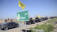 Pasukan keamanan Irak dan para petempur milisi Syiah bergerak dari Samarra ke bagian pinggiran kota Tikrit, di utara Baghdad. (Reuters)