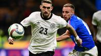 Italia saat bersua Jerman di leg 1 perempat final UEFA Nations League. (Marco BERTORELLO / AFP)