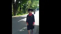 Penuhi Nazar, Chairul Ma’atini, mahasiswa Universitas Negeri Gorontalo (UNG) yang berjalan kaki sejauh 62 kilometer. (Liputan6.com/Arfandi Ibrahim)