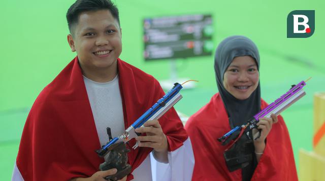Prestasi gemilang dipersembahkan oleh duet M. Iqbal Raia Prabowo dan Arista Perdana Putri Darmoyo dari nomor Shooting 10 meter Air Pistol Mixed Team pada SEA Games 2025 Thailand. (Bola.com/Bagaskara Lazuardi)