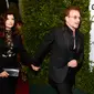 Alison Hewson atau Ali Hewson dan Bono U2 saat menghadiri Glamour Women Of The Year 2016 di NeueHouse Hollywood pada 14 November 2016 di Los Angeles, California. (KEVORK DJANSEZIAN / GETTY IMAGES NORTH AMERICA / GETTY IMAGES VIA AFP)