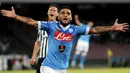 Penyerang Napoli, Lorenzo Insigne melakukan Selebrasi usai mencetak gol ke gawang Juventus pada lanjutan liga Italia di Stadion San Paolo, Minggu (27/9/2015). Napoli menang atas Juventus dengan skor 2-1. (REUTERS/Stringer)