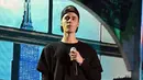 Lewat akun Instagramnya, Justin menuliskan alasannya. Ia menyampaikan permohonan maafnya kepada para penggemar, dan mengatakan memerlukan waktu untuk beristirahat dari aktivitasnya itu.  (AFP/Bryan Bedder)