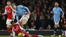 Kemenangan atas Manchester City menjaga posisi Arsenal di peringkat dua klasemen Liga Inggris 2024/2025 dengan 50 poin dari 24 laga. Arsenal menempel ketat posisi Liverpool dengan selisih enam poin, sementara Man City tertahan di peringkat keempat. (Glyn KIRK/AFP)