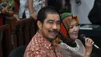 Walikota nonaktif Palembang Romi Herton dan istrinya Masyitoh di Pengadilan Tipikor. (Liputan6.com/Miftahul Hayat)