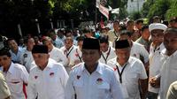 Prabowo dan Hatta tampak berjalan dengan langkah yang penuh optimistis (Liputan6.com/Johan Tallo)