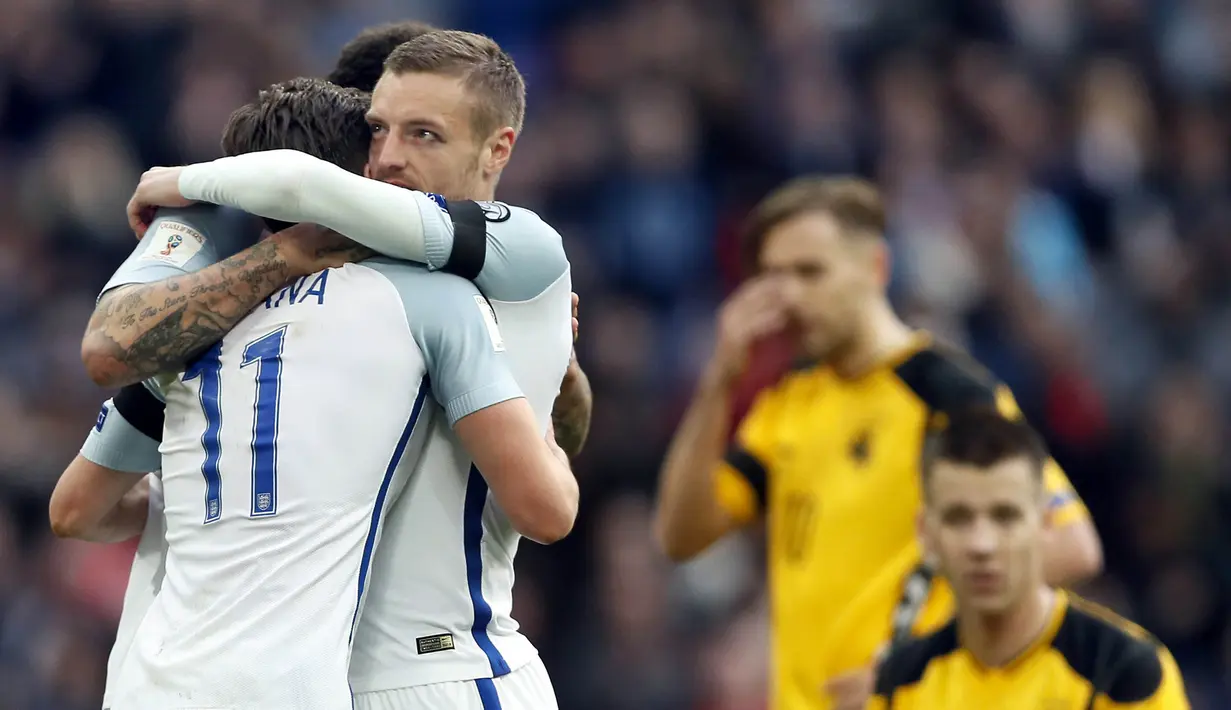 Striker Inggris, Jamie Vardy, merayakan gol yang dicetaknya ke gawang Lithuania pada laga kualifikasi Piala Dunia 2018 di Stadion Wembley, Inggris, Minggu (26/3/2017). Inggris menang 2-0 atas Lithuania. (AP/Kirsty Wigglesworth)