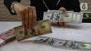 Mengutip data Bloomberg, pada penutupan perdagangan awal pekan ini, Senin (13/1/2025), nilai tukar rupiah melemah signifikan terhadap dolar Amerika Serikat (AS). (Liputan6.com/Angga Yuniar)
