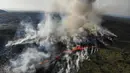 Foto udara yang diambil pada 10 Juli 2023 ini menunjukkan asap mengepul dari lahar yang mengalir selama letusan gunung berapi di dekat Litli Hrutur, barat daya Reykjavik di Islandia. (AFP/Kristinn Magnusson/Iceland Out)