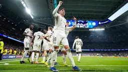 TIga gol Federico Valverde di babak pertama membawa Real Madrid meraih kemenangan krusial di leg pertama babak 16 besar Liga Champions 2025/2026. Tampak dalam foto, pemain Real Madrid, Federico Valverde, merayakan golnya pada pertandingan leg pertama babak 16 besar Liga Champions 2025/2026 melawan Manchester City di stadion Santiago Bernabeu, Rabu 11 Maret 2026 waktu setempat atau Kamis 12 Maret 2026 dini hari WIB. (AP Photo/Jose Breton)